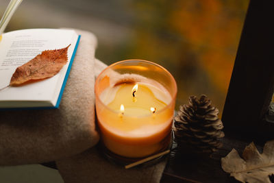 Candle and autumn decor. autumn home decor. cozy fall mood.