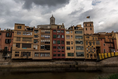 Buildings in city against sky