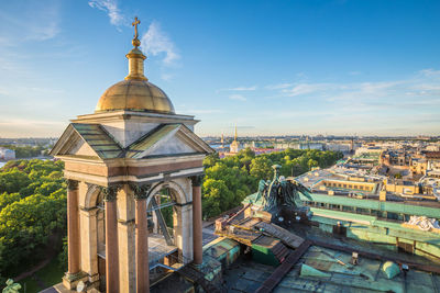 Cathedral in city against sky