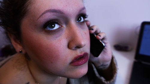 Close-up portrait of woman looking away