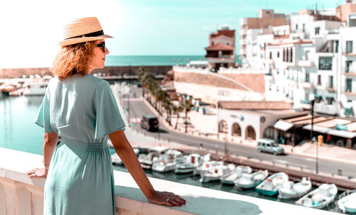 Woman standing in city