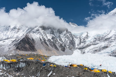 Scenic view of snowcapped mountains against sky