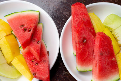 High angle view of fruits in plate on table