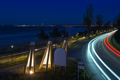 Light trails on road at night