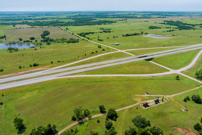 High angle view of road amidst field