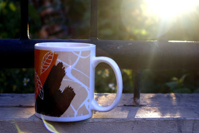 Close-up of coffee cup on table