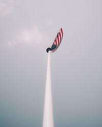 Low angle view of flag against sky