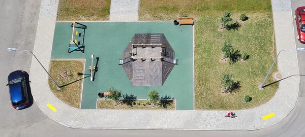 High angle view of information sign on road in city