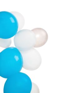 Close-up of balloons against white background
