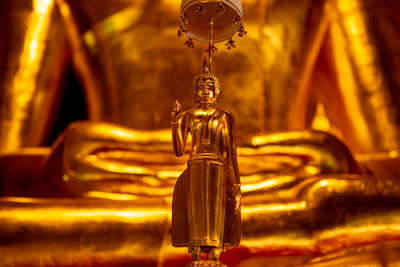 Close-up of buddha statue in temple