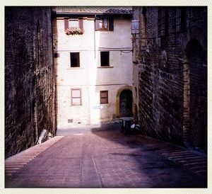 Narrow alley along buildings
