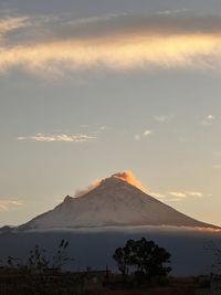 Scenic view of mountains against sky during sunset