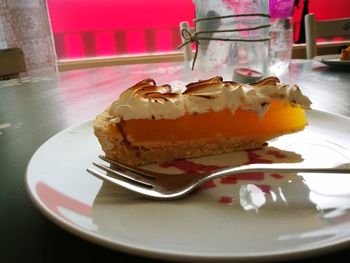 Close-up of cake in plate on table