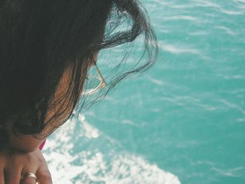 Close-up of woman looking at sea