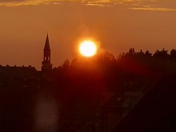 Silhouette of buildings at sunset