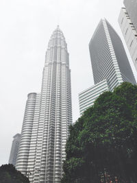 Low angle view of skyscrapers against sky