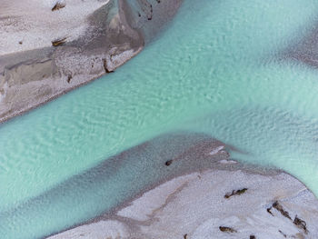 High angle view of surf on beach