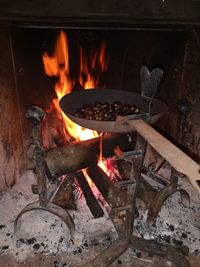 High angle view of fire on barbecue grill