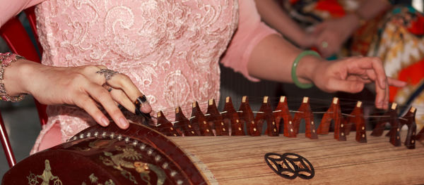 Close-up of woman with hands