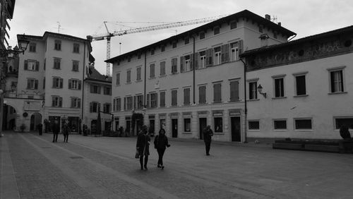 People in front of building