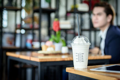 Close-up of man working in restaurant