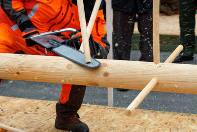 Low section of man working at construction site