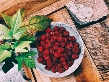 High angle view of strawberries on table