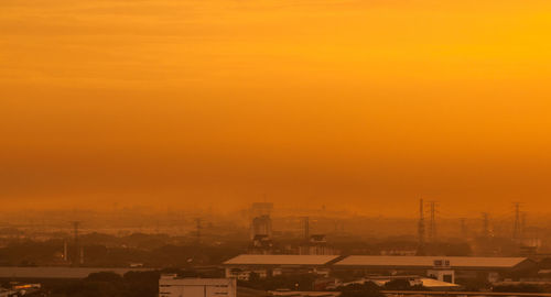 Aerial view of city against sky