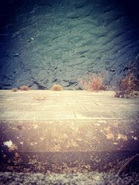 High angle view of snow on footpath