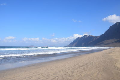 Scenic view of beach against sky