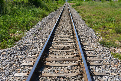 Railway with sun rays background. landscape with railway station.