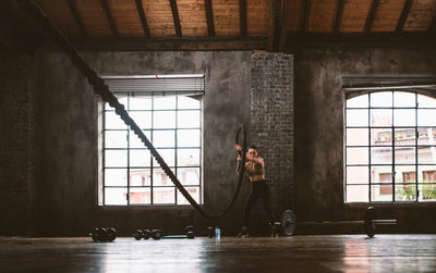 Man standing by window