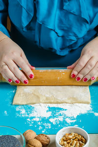 Midsection of man preparing food