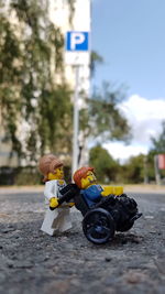 Close-up of toy car on road