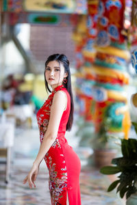 Portrait of smiling woman at temple