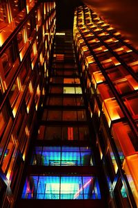 Low angle view of illuminated building at night