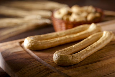 High angle view of bread on cutting board