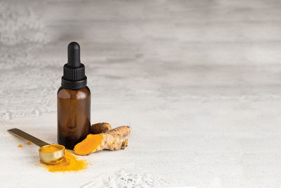 Close-up of beer bottle on table