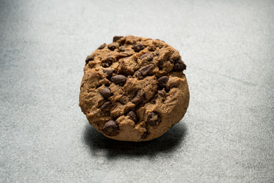 Close-up of chocolate chip cookie on table