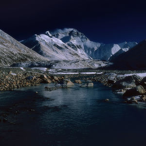 Scenic view of snowcapped mountains against sky during winter