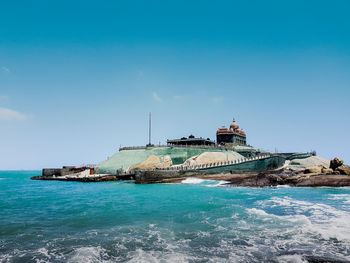 Scenic view of sea against blue sky