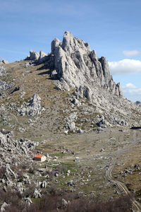 Scenic view of rocky mountains against sky