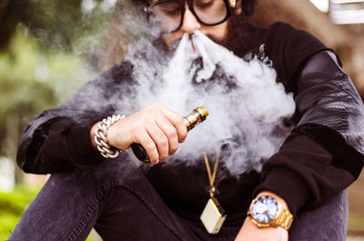 Man smoking electronic cigarette