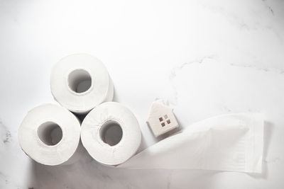 High angle view of papers on white table