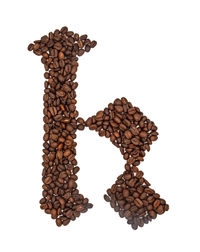 High angle view of coffee beans against white background