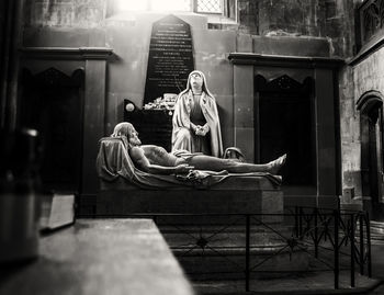 Woman sitting on floor
