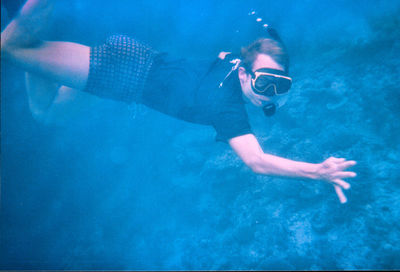 Woman swimming underwater