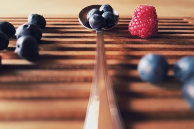 Close-up of blueberries and raspberries on table