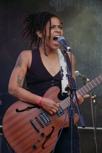 Young woman playing guitar