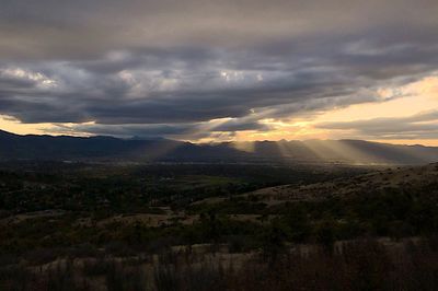 Scenic view of landscape against sky during sunset